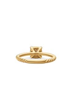 a gold ring with a bow on the side