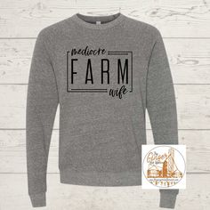 Mediocre Farm Wife Get this graphic in your choice of a short sleeve graphic tee, long sleeve graphic tee, crewneck sweatshirt or hooded sweatshirt. With multiple color and sleeve options in super soft materials you can customize your style to get what you wan.  All shirts are unisex size, true to size and super soft. Size charts are in images. All shirts are handmade to order, please allow one to two weeks.  If you need a RUSH please email me. Care instructions - turn inside out and machine wash cold.  No bleach or softener.  Do not iron. Tumble dry low. Ask about custom options if you are looking for something different! Farm Wife, Long Sleeve Graphic Tee, Multiple Color, Size Charts, Cricut Ideas, Shirt Ideas, Long Sleeve Tee, Hooded Sweatshirt, Crewneck Sweatshirt