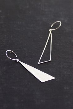 Sterling Silver Asymmetric Triangle Dangle by SDMarieJewelry Unique Triangle Sterling Silver Jewelry, Everyday Silver Triangle Earrings, Sterling Silver Triangle Earrings For Pierced Ears, Modern Sterling Silver Linear Earrings With Ear Wire, Modern Sterling Silver Drop Linear Earrings, Sterling Silver Triangle Jewelry With Matching Earrings, Silver Triangle Minimalist Earrings, Contemporary Linear Earrings For Gifts, Nickel Free Triangle Sterling Silver Earrings