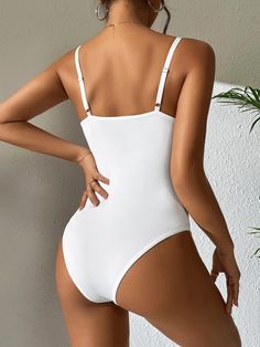 The Contrast Lace Sheer Cami Bodysuit is a stylish and sophisticated wardrobe staple. Crafted from a combination of polyester and elastane for a comfortable fit, this bodysuit features an all-over plain pattern with contrasting lace details. The spaghetti straps and slim fit silhouette create an elegant V-neckline, while the natural waistline completes the look. Perfect for any occasion, this cami bodysuit offers modern style without compromising on comfort or quality. Features: Pattern Type: Pl Sophisticated Wardrobe, Comfy Jumpsuits, Cami Bodysuit, Fabric Suppliers, Lace Cami, Sheer Sleeves, Black Bodysuit, Style Moderne, Lace Detail