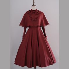 A dress, a short cape, and an embroidered apron that will draw you in with its mysterious charm. The dress has a high neck design and a snake is embroidered on the chest. The dress and cape are decorated with lace embroidery, creating a delicate and gorgeous look. 
 
 
 

 

 
 
 Item 
 
 One piece (long length, standard length, middle length) 
 Cape 
 Apron 
 
 
 Size image (*dress) 
 Long length 
 
 Standard length 
 
 Middle length 
 
 
 Size 
 
 One Piece 
 
 Long length 
 
 XS size 
 
 Leng Embroidered Apron, High Neck Designs, Lace Embroidery, Long Length, Free Size, Embroidered Dress, Cape, Long Dress, Apron