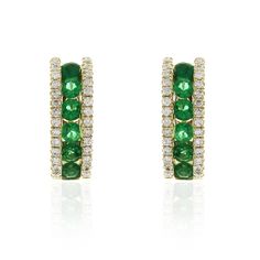 Every woman can always use a pair of classic diamond huggie earrings to add to their wardrobe.Metal: 18K White GoldDiamond Weight: 56 Round Brilliant Cuts 0.17ct t.w.Emerald Weight: 12 Round Cuts 0.39ct twEarring Lenght: 13mm x 4mm Estimated production time is 4 - 5 weeks. Diamond Huggie Earrings, Huggie Earrings, Emerald Diamond, Huggies Earrings, White Gold Diamonds, Every Woman, Round Brilliant, Round Cut, Gold Diamond