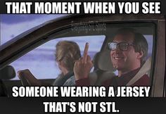 two people in a car with the caption that moment when you see someone wearing a jersey that's not stl