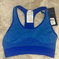 Brand New With Tags Blue Womens Asics Sports Bra Blue Stretch Functional Sports Bra, Blue Seamless Activewear For Sports, Fitted Breathable Blue Sports Bra, Fitted Blue Breathable Sports Bra, Blue Seamless Activewear Sportswear, Functional Fitted Blue Sports Bra, Fitted Functional Blue Sports Bra, Blue Stretch Sports Bra With Light Support, Blue Activewear With Light Support For Sports