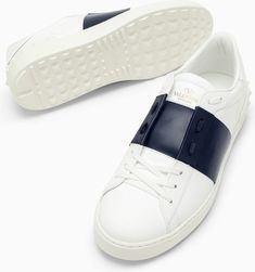 Elevate your sneaker game with this stunning white leather trainer. The eye-catching marine blue color-contrast band and decorative studs add a touch of luxury and sophistication to this classic style. Whether you're running errands or meeting friends for brunch, these sneakers are the perfect combination of comfort and style. The lace-up fastening and rubber sole ensure a secure fit and long-lasting durability, making these sneakers a must-have addition to your wardrobe. Material: White leather Marine Blue Color, Trendy Fits, Marine Blue, Leather Trainers, Leather Cap, Comfortable Sneakers, Beach Tote Bags, Lanvin, Sneakers White