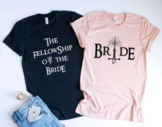 two t - shirts with the words bride and the fellowship on them, sitting next to each other