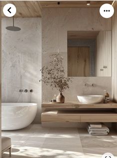 a bathroom with two sinks and a bathtub