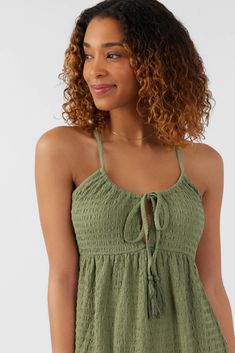 Sweet and flowy woven mini dress that features a solid color design, racerback detail and front tie closure. O'Neill Women's mini dress 25" In length Solid color wash Empire waist with bodice keyhole Tunneled spaghetti straps at keyhole Racerback Textured knit fabrication 95% Polyester, 5% Elastane Green Casual Mini Dress With Tie Straps, Casual Green Mini Dress With Tie Straps, Green Mini Dress With Tie Straps For Summer, Green Sleeveless Mini Dress With Tie Straps, Sleeveless Green Mini Dress With Tie Straps, Green Mini Dress With Tie Straps, Green Mini Dress With Tie Straps For Beach, Casual Green Halter Neck Mini Dress, Spring Green Mini Dress With Drawstring