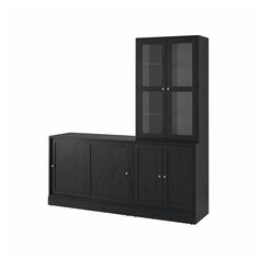 a black cabinet with glass doors and shelves on the bottom, against a white background