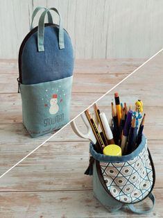 pencils and markers are in a bag on a wooden table next to an insulated pen holder