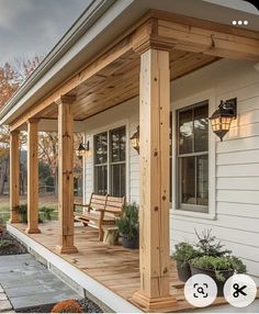 a wooden porch with two benches on it