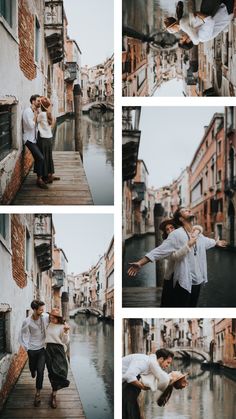 two people standing on a dock in front of some buildings