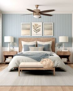 a bedroom with blue walls and white furniture