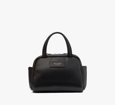 Puffed up yet practical this satchel features a crossbody strap to go hands-free along with pockets to keep you organized. | Kate Spade Puffed Satchel, Black Kate Spade Travel Satchel With Detachable Strap, Kate Spade Satchel With Detachable Strap For Travel, Kate Spade Black Satchel For Travel, Kate Spade Black Travel Satchel, Kate Spade Travel Satchel, Nappa Leather, Crossbody Strap, Kate Spade New York, Hands Free