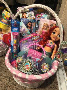 a basket filled with toys and other items