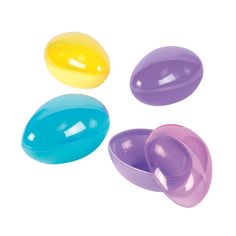 three plastic egg shaped like an egg with different colors and shapes on each side, set against a white background