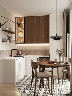 a dining table and chairs in a room with white walls, black and white floor tiles