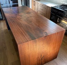 a large wooden counter top in a kitchen