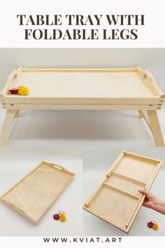 a wooden tray with foldable legs and flowers on it