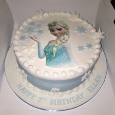 a frozen princess birthday cake in a box