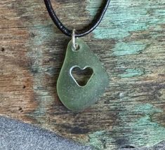 This necklace is made with sea glass I hand picked on the shoreline of the beaches from Kittery Maine to as far north as Beals Island Maine.  Sterling silver jump ring is welded.  With hand carved heart. Kittery Maine, Carved Heart, Green Sea, Sea Glass Jewelry, Moss Green, Glass Jewelry, Jump Rings, Hand Picked, Sea Glass