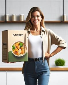 a woman is holding a box with food in it