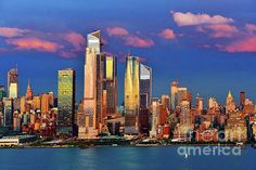 the skyline of new york city at sunset from across the water greeting card by panoramic images