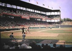 a baseball game in progress with the batter up to plate