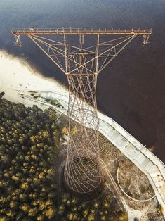 an aerial view of a power line over water