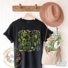 "Forest Fern Shirt, Botanical tshirt, Herb Floral Tee, Forestcore Aesthetic, Goblincore, Forest Graphic Tee, Nature Shirt, Nature Lover Shirt Gift for Plant Lover, Gardening Shirt, Comfort Colors, Wildflowers Shirt, Botanical tshirt, Herb Floral Tee, Flower Shirt, Floral Tee, Gift for Her, Shirt Gift for Plant Lover, Gardening Shirt, Plant Lover Graphic Tee, Plant lady t  Plant Lady, Plant Gift for Her, Gardening Shirt, Plant Lover Graphic Tee, Plant T shirt, Boho Tee, Retro Gardening Shirt, Pla Forestcore Aesthetic, Plant T Shirt, Botanical Tshirt, Forest Graphic, Forest Fern, Spring Tees, Cottagecore Shirt, Boho Tees, Botanical Shirt