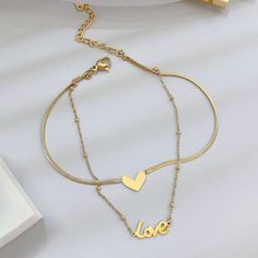 Gold Color Foot Jewelry Vintage Trendy Double Layer Heart Letter Pendant Anklet For Women Style 1: Temperament Exaggerated Bohemian Boho OL Classic Korean France IG INS instagram Style: Elegant Trendy Fashion Punk Gothic Vinatge Boho Style: TRENDY Shaped: Geometric Letter Heart Double Layer Shape\pattern: Heart Season: Spring Summer Fall Winter Price: Wholesale Cheap Free Shipping Occasion: Wedding Birthday Anniversary Part Everyday Lifey Model Number: 3256805215450434 Metals Type: Stainless Steel Material: 316L stainless steel Titanium steel Crystal Zirconia Rhinestone Metal Gold Plated Material: Metal Item Type: Anklets Gender: Women Girl Student Teenager Wife Girlfriend Gender: Women Item Name：Heart Anklet Material: 316L stainless steel+High temperature furnace electroplating Trendy Heart-shaped Double Chain Jewelry, Trendy Adjustable Heart Anklets, Trendy Heart-shaped Anklets For Gifts, Trendy Gold Heart-shaped Anklets, Adjustable Heart-shaped Metal Anklet, Luxe Boutique, Heart Anklet, Titanium Bracelet, Layered Chains