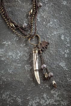 "Ethnic, Multi Strand Brown Braided Leather and Chain Necklace with Bone, Copper Elephant and Heart Pendants. Lead Compliant. Length: 17\"." Multilayered Necklace, Primitive Jewelry, Sundance Style, Diy Jewelry Necklace, Bone Pendant, Heart Pendants, Multi Layer Necklace, Tassel Jewelry, Unusual Jewelry