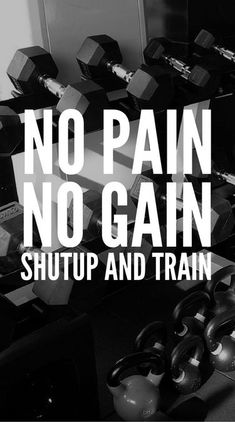 there is no pain, no gain, shut and train sign in front of dumbbells