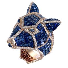 This bear’s expressionless stare is in contrast to its glittering coat of 39.05-Carat Blue Sapphires further enhanced with rows of 1.27-Carat White Diamonds mounted on 18k gold and palladium. The high craftsmanship of this ring continues in its reverse side with an openworked precious metal structure. Blue Sapphires are In Invisible Setting. This ring, as with all Zorab Creation pieces, is sent with a unique serial number to validate its authenticity. Ring Size 7 Bear Ring, Jewelry Rendering, Weird Jewelry, High Jewelry Ring, Art Jewelry Design, Expensive Jewelry Luxury, Blue Bear, Diamond Fashion Rings, Expensive Jewelry