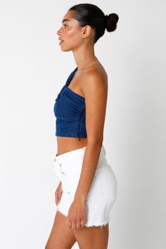 STYLE INFORMATION: The Dallas Denim One Shoulder Crop Top is the perfect top to pack for your next bachelorette party! Medium-wash denim fabric shapes this one-shoulder top with a cutout, ruched detailing. Style with cowgirl boots and denim shorts for a fun girls night out! DETAILS & CARE: Cotton/Spandex. Hand wash cold. Imported. SHIPPING: Orders are processed within 1-2 business days. Packages are shipped out Monday-Friday, holidays are excluded. Fitted Lace Trim Tube Top For Spring, Stretch Cotton Tops With Lace Trim, Chic Stretch Tops With Lace Trim, Stretch Tops With Lace Trim For Day Out, Versatile Cotton Tube Top For Spring, Cropped Tops For Summer Layering, Cropped Tops For Layering In Summer, Cropped Cotton Tops With Lace Trim, Cropped Cotton Top With Lace Trim