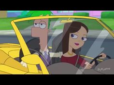 a woman driving a car with a man behind her