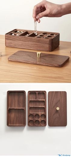 three wooden trays with spoons in them on a table next to each other