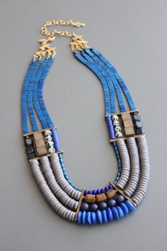 ZLD122 – David Aubrey Inc Blue Jewelry With Wooden Beads, Unique Handwoven Blue Beaded Necklace, Artistic Blue Beaded Necklace, Artisan Multi-strand Beaded Turquoise Necklace, Blue Multi-strand Wooden Bead Necklaces, Southwestern Blue Multi-strand Turquoise Necklace, Artisan Multi-strand Blue Necklaces, Blue Goldstone, Trendy Boho