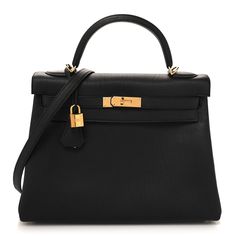 This is an authentic HERMES Togo Kelly Retourne 32 in Black. This Kelly handbag is crafted of richly textured calfskin leather in black. The bag features a reinforced leather top handle, gold plated hardware and a clochette with keys for the padlock. This bag features a strap closure with a signature Kelly turn lock. The flap opens to a matching goatskin leather interior with zipper and flat pockets. Kelly Handbag, Leather Interior, Leather Top, Top Handle, Calf Skin, Gold Plate, Zipper, Handbags, Leather