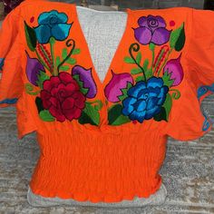 Cute Orange Top With A Beautiful Flower Blue Hot Pink Purple And Red Beautiful Work Elastic From The Waist Open V-Neck Front And Back Never Been Worn Pink Ladies Outfit, A Beautiful Flower, Floral Ribbon, Embroidery Top, Flower Blue, Orange Top, Wear Green, Career Wear, Striped Tank Top