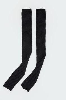 PRODUCT INFO Leg warmers Knit fabric Acrilan Measurements (In): Length 25.2 Item care: Hand wash Black Elastic Casual Leg Warmers, Casual Black Elastic Leg Warmers, Black Stretch Leg Warmers For Fall, Stretch Black Ribbed Leg Warmers, Casual Black Knit Leg Warmers, Black Knitted Leg Warmers For Fall, Fitted Black Leg Warmers For Winter, Black Leg Warmers For Cold Weather, One Size, Black Leg Warmers For Cold Weather