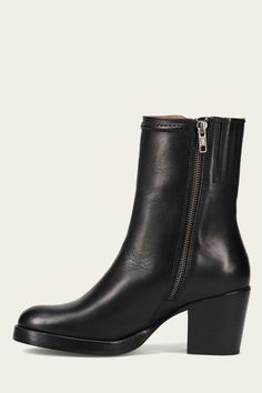 The hallmark of these ankle boots is the vintage pull-up leather's softness and sheen. Their unique character is intensified by the heritage, raised stitching, and strong heel, while the round toe, leather lining, and side zipper provide comfort and conve