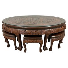 This beautiful Teak wood Coffee Table has a lot of Chinese traditional massive carving works of Chinese Characters and traditional Chinese Architecture design on the top. This coffee table made from solid teak wood and has beautiful ornate carving works on the top and side. It come with 6 matching stools that can be nested underneath the coffee table. Look at the pictures, All Hand-crafted with exquisite detail. Some age wear but definitely quality workmanship you don't find anymore today! Don't Work Table Design, Nesting Stools, Asian Coffee Table, Chinese Coffee Table, Teak Wood Coffee Table, Carved Coffee Table, Traditional Chinese Architecture, Organic Modern Dining Room, African Table