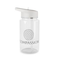 a glass water bottle with a straw in the top and compassion logo on it