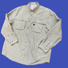 L.L. Bean Mint Green Fishing Outdoor Button Down Shirt Men's Size Large Khaki Buttoned Tops For Outdoor, Outdoor Button-up Camp Shirt With Pockets, Outdoor Button-up Tops With Functional Buttons, Green Buttoned Tops For Outdoor, Long Sleeve Camp Shirt With Pockets For Outdoor, Khaki Outdoor Shirt With Button Closure, Collared Shirt With Snap Buttons For Outdoor, Khaki Collared Camp Shirt For Outdoors, Snap Button Long Sleeve Outdoor Shirt