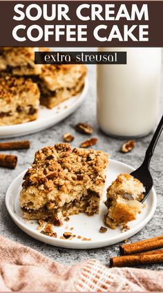 a close up of a piece of cake on a plate near a glass of milk