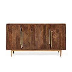 the sideboard is made from wood and has two doors, one with brass handles