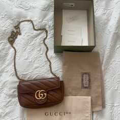 Gucci Marmot Super Mini Crossbody Very Good Condition And Well Taken Care Of. Was In Dust Bag When It Was Not Used. All Original Packaging In Perfect Condition And Included 100% Authentic. Gucci Gg Marmont, Mini Crossbody, Leather Crossbody, Brown Leather, Limited Time, Dust Bag, Bag Lady, Packaging, Gucci