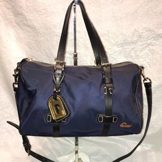 Excellent Used D&B. Beautiful Bag Looks Brand New! Questions? Leave A Comment Below! Blue Bags With Luggage Sleeve, Blue Nylon Shoulder Bag With Luggage Sleeve, Designer Blue Shoulder Bag With Leather Trim, Casual Blue Shoulder Bag With Leather Trim, D B, Dooney & Bourke Bags, Beautiful Bags, Dooney Bourke, Satchel