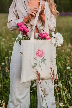 "100% COTTON TOTE BAG \"PEONY\" ✦ Beautiful Floral Tote Bag with a romantic and original print design is for your daily activities, studies and shopping! The print of peony will give your look feeling of lightness, creativity and will allow you to feel closer to nature! Everyday Beige Bag can easily match with your outfits. ✦ The illustration \"Peony\" is a digital artwork created with love and passion. With our illustrations we want to share the feeling of freedom, joy and inspiration! Feel free and express your uniqueness! ✦ MATTERIAL: 100% Cotton ✦ COLOR: Beige ✦ CARE: Handwash only at 30 degrees ✦ FREE SHIPPING WORLDWIDE  United Kingdom: 3-5 business days Germany: 3-5 business days  United States: 5-14 business days Europe: 5-14 business days Australia, New Zealand and Oceania: 15-30 b Feminine Tote Bag With Removable Pouch, Feminine Tote Bag For Spring, Spring Floral Print Cream Bags, Feminine Spring Bags For Daily Use, Pink Shoulder Bag For Everyday Use, Pink Shoulder Bag For Everyday And Mother's Day, Pink Shoulder Bag For Mother's Day, Pink Shoulder Bag For Everyday Use On Mother's Day, Spring Gift Bags With Large Capacity